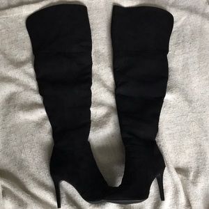 Over the knees heeled boots